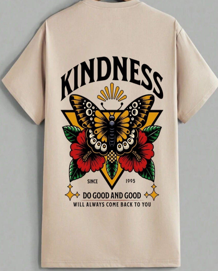 Beige t-shirt with a butterfly graphic and motivational text on a gray background