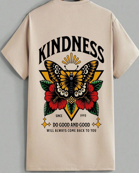Beige t-shirt with a butterfly graphic and motivational text on a gray background